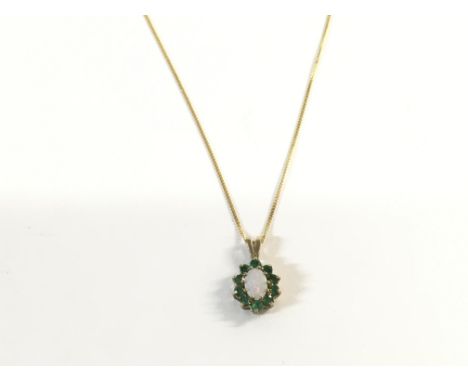 A 9ct gold chain with Opal pendant. Also small pendant and a rolled gold locket. Total weight 5.3G Postage A.