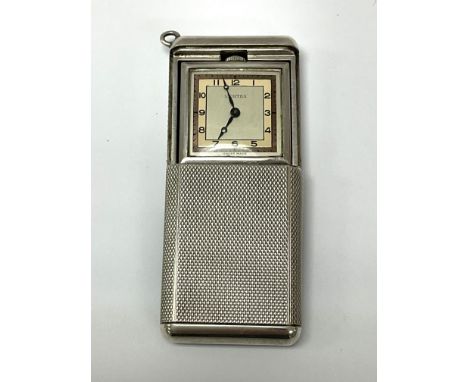 A vintage Vertex Hallmarked silver drivers watch with engine turned case. (A)