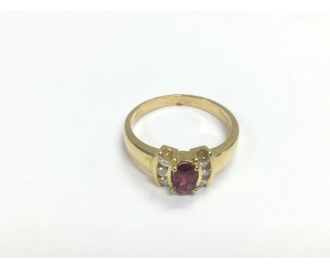 An 18ct gold p, ruby and diamond set ring, approx 4g and approx size O. Shipping category A.