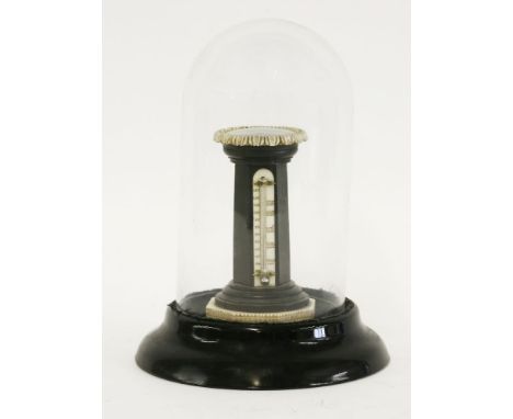 An unusual ebony and ivory pedestal 'Porters Magnetic Sundial',or 'Floating Compass', the floating compass displayed as a typ