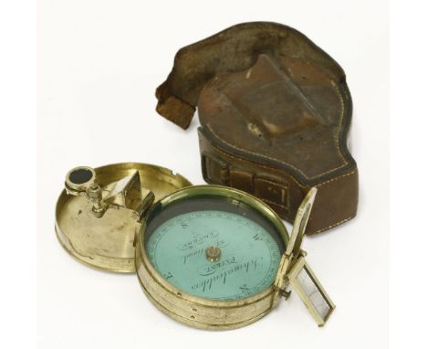 A brass-cased patent pocket compass,19th century, the circular floating dial signed 'Schmalcalders Patent, 82 Strand, London'