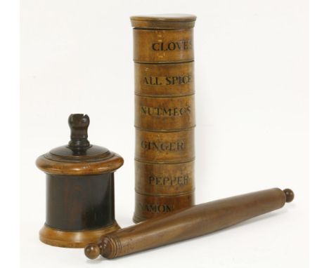 A treen six-tier spice tower of cylindrical form,early 19th century,a rolling pin, anda lignum vitae string box (3)