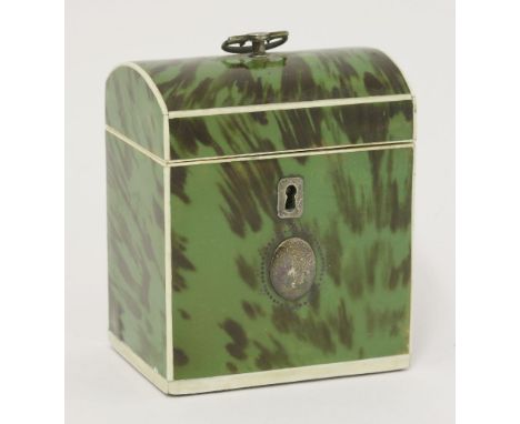 A George III green tortoiseshell single compartment tea caddy,with a domed cover, ivory borders and a white metal oval plaque