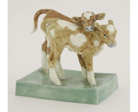 A Royal Worcester Group of two calves, modelled by Doris Lindner, numbered 3146 and inscribed,12cm high