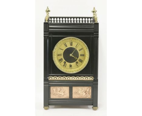 A French black slate mantel clock,late 19th century, the 'Aesthetic' design case with copper and brass mounts, with three tra
