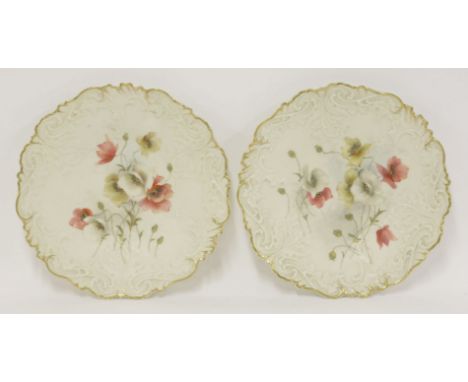 A pair of Royal Worcester Grainger & Co. Plates,dated 1893, painted with flowers within moulded and gilt borders, with no. 44