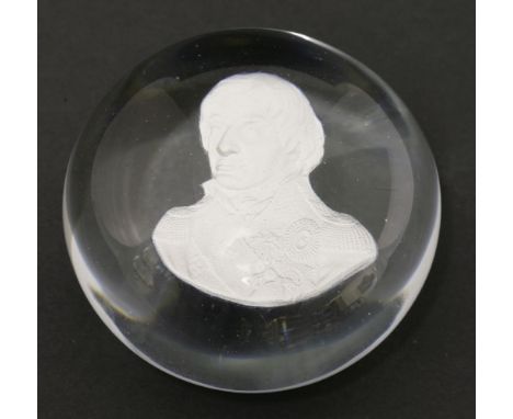 A sulphide Paperweight, 19th century, containing a portrait of Admiral Lord Nelson, in profile facing left,6.5cm diameter4.5c