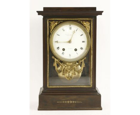 An eight-day twin train  pendulum driven striking mantel clock,the white enamel dial signed 'Camerer Kuss & Co., Oxford St.' 