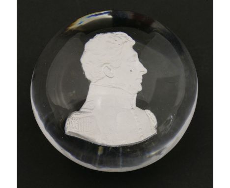 A sulphide Paperweight, 19th century, containing a portrait of an officer in profile, facing right,6.5cm diameter5cm high