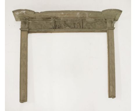 A Georgian wood and plaster fire surround, with cast harvest motifs of sheaves of grain, a rake and pitchfork and wheat husks