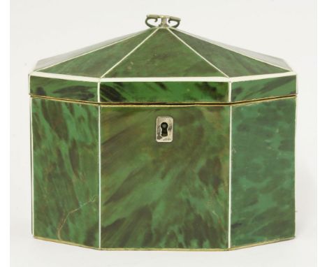 A George III green tortoiseshell twin compartment tea caddy,of long octagonal shape with ivory borders,16.5cm wide14cm high