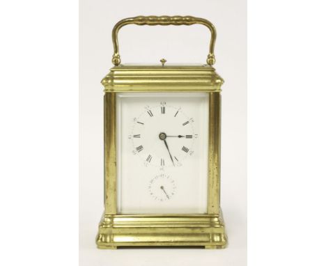 A French brass carriage clock, second half of the 19th century, repeating mechanism and alarm dial, and quarter chiming on a 
