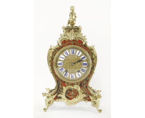 A mahogany and gilt brass mantel clock,the enamelled dial inscribed 'Camerer Kuss & Co., 56 New Oxford St., London', with a t