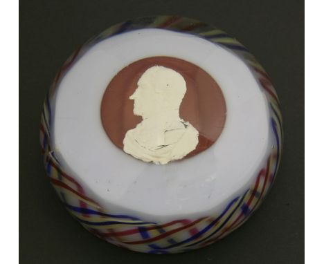 A sulphide Paperweight,19th century, possibly Val St Lambert, with a portrait of a man in profile, facing left and a coloured