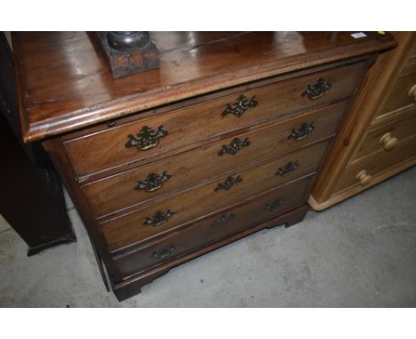 A 19th Century mahogany chest of nice proportions at just 32' (81cm) wide , with brushing slide and four long drawers , on br