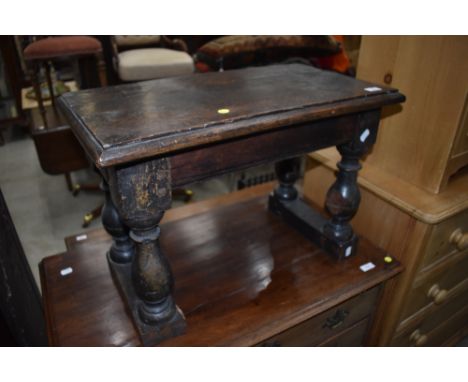 A period oak stool or side table, in the style of a coffin stool but possibly been part of a buffet or similar item