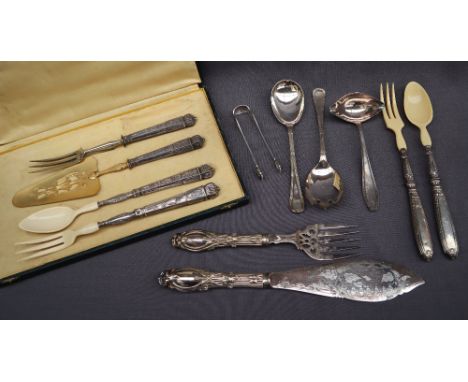 A continental white metal part serving set, comprising salad servers with bakelite ends, cake slice and carving fork, togethe