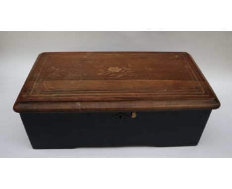 A 19th century inlaid rosewood cylinder music box, the 11cm cylinder playing 8 aires, 36cm wide 