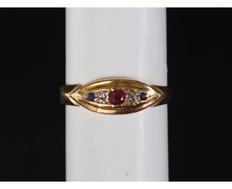 An 18ct yellow gold line ring, set with a central ruby flanked by two old round cut diamonds and two sapphires, size N 1/2, a