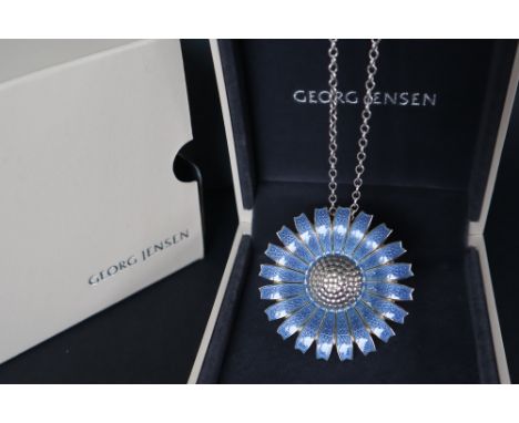A Georg Jensen blue daisy brooch / pendant, 43mm diameter  on a silver chain CONDITION REPORT: Overall condition is good, the