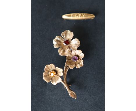 A 9ct gold brooch of floral form set with a garnet, amethyst and citrine together with a yellow metal "BABY" brooch, overall 