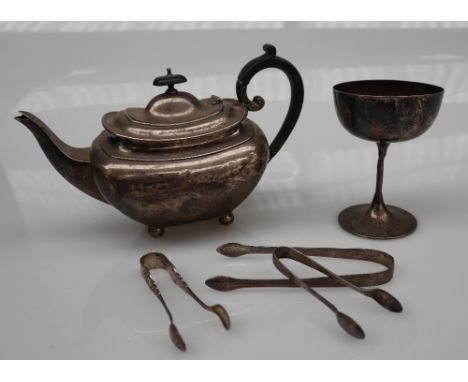 A George V silver teapot, of oval form on ball feet, Sheffield, 1922, together with a silver goblet trophy cup and silver sug