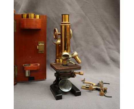 A Carl Zeiss monocular microscope, with spare lenses, platform etc, cased 