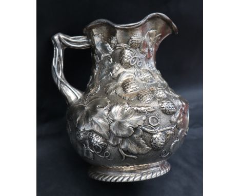 American Silver - A Jones, Ball & Poor of Boston Pure Coin jug, of baluster form with a naturalistic handle embossed with hop