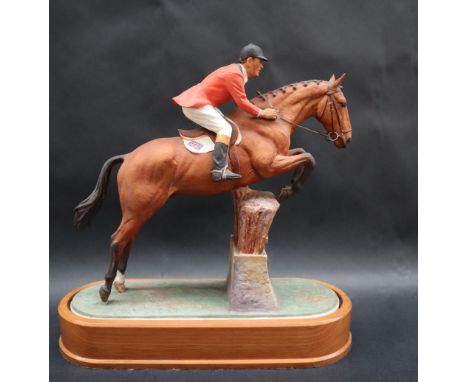 A limited edition Worcester Royal Porcelain company limited equestrian statuette of Foxhunter and Lt Col H M Llewellyn CBE, N