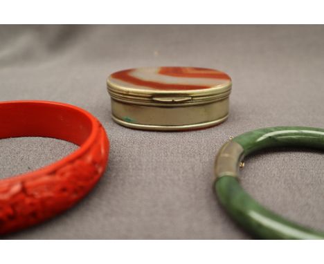 A hardstone box, together with a lattice ring, a jade bangle, another bangle, other wristwatches, cufflinks, silver backed br