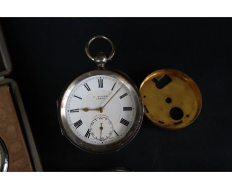 A George V silver open faced pocket watch, with a white enamel dial and seconds subsidiary dial inscribed H Stone, Leeds, Bir