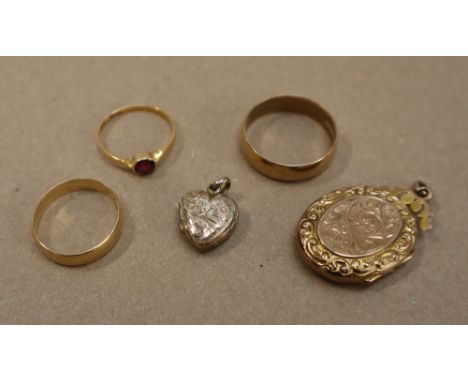 An 18ct gold wedding band, size P, approximately 2 grams together with 9ct gold wedding band, size U, approximately 3 grams, 