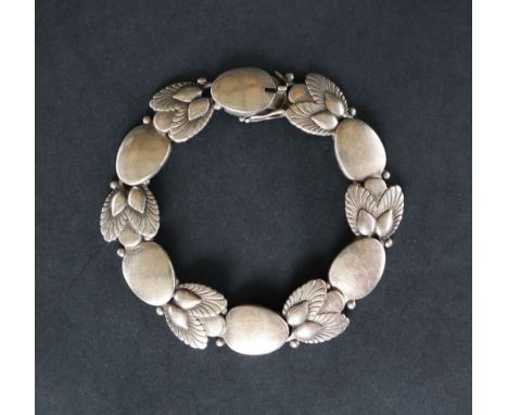 A Georg Jensen 'Bittersweet' silver bracelet, designed as interspersed links of leaves and oval polished discs, with box clas
