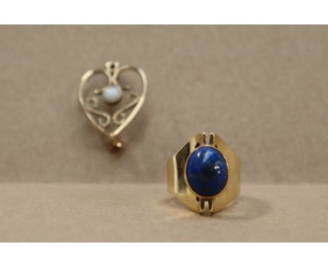 A 9ct gold ring set with a lapis lazuli panel, size K, together with a 9ct gold opal set brooch, approximately 12.5 grams