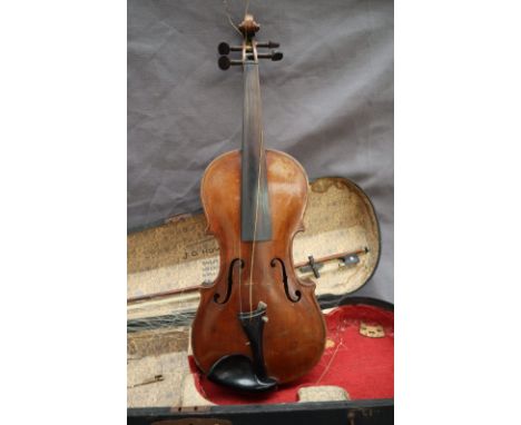 A Violin with two piece back and ebony stringing, overall 58.5cm long, back not including button 35.5cm long together with a 