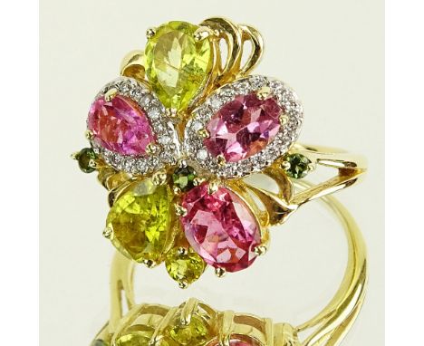 Lady's Vintage Pink Tourmaline, Yellow Quartz, Diamond and 14 Karat Yellow Gold Ring. Signed 14K. Very good condition. Ring s