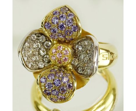 Lady's Vintage Italian Sidra White, Fancy Pink and Purple Diamond and 18 Karat Yellow Gold Flower Ring. Signed Sidra, Italy, 