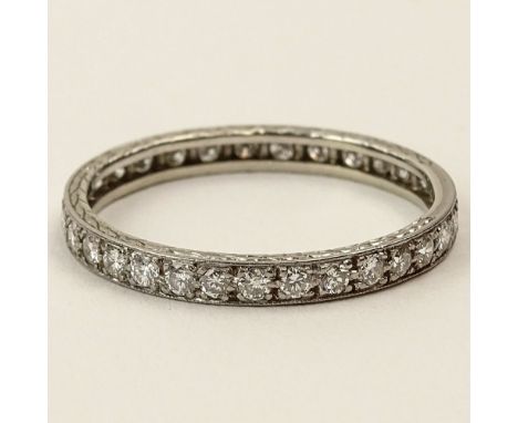 Lady's Vintage Approx. 1.0 Carat Round Cut Diamond and Platinum Eternity Band. Diamonds G-H color, VS1-SI1 clarity. Unsigned.