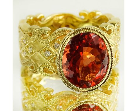Lady's Approx. 5.73 Carat Oval Cut Sunstone, .15 Carat Diamond and 18 Karat Yellow Gold. Sunstone with vivid saturation of co