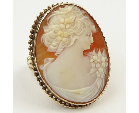 Lady's Vintage 14 Karat Yellow Gold and Carved Shell Cameo Ring. Unsigned. Good condition. Ring size 2-1/2 (with sizing balls