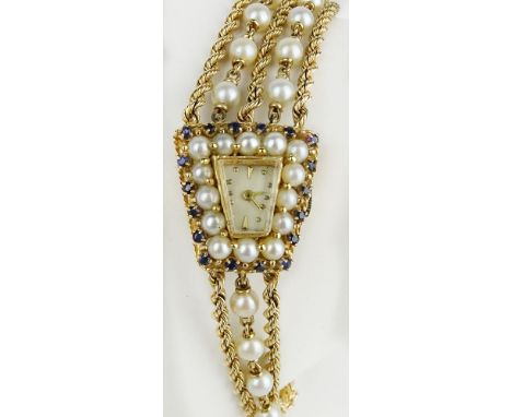 Lady's Edwardian 14 Karat Yellow Gold, Diamond, Sapphire and Pearl Bracelet Watch. Signed 14K. Not running, needs servicing. 