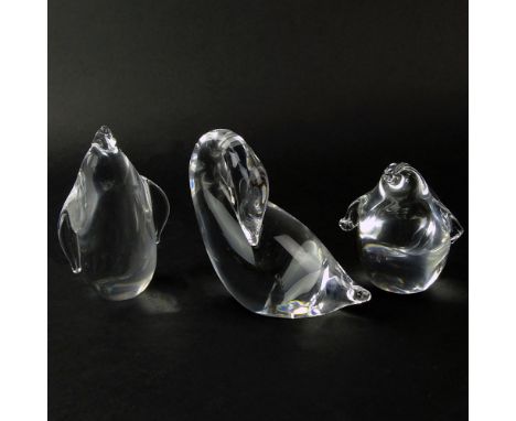 Lot of Three (3) Steuben Crystal Bird Figurines. Signed. Includes 2 penguins, 1 swan. Signed. 1 penguin with broken wing. Swa