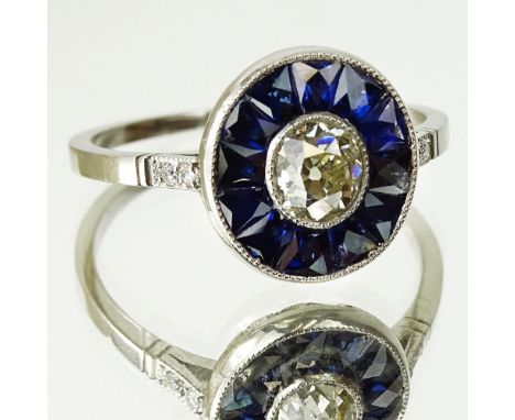Lady's Art Deco European Cut Diamond, Sapphire and Platinum Ring. Diamond J-K color, SI clarity. Sapphires with vivid saturat