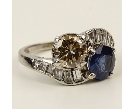 Lady's Vintage Approx. 1.70 Carat Sapphire, 1.17 Carat Round Cut Diamond, .65 Carat accent Diamond and Platinum Cross Over Ri