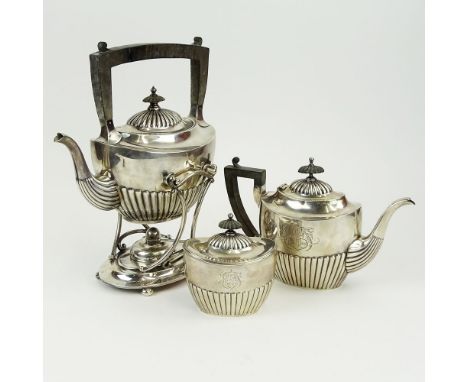 Vintage JE Caldwell Sterling Silver Partial Tea Service. Ebonized wood handles. Includes tea pot, lidded sugar, tipping hot w