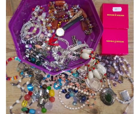 A box of assorted vintage and costume jewellery.  