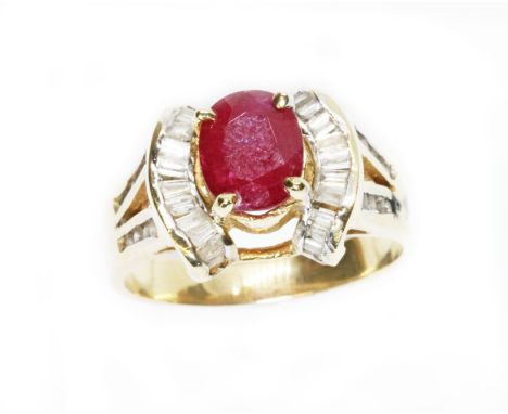 A ruby and diamond ring, the band marked '14K', gross weight 6.7g, size S.  