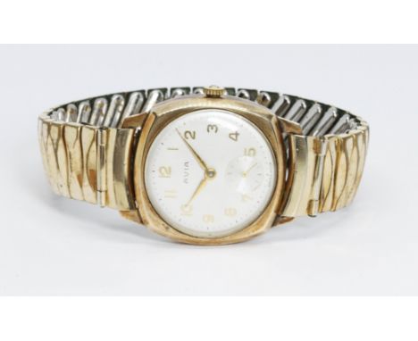 A hallmarked 9ct gold Avia wristwatch, width 27mm, 15 jewel manual wind movement, flexi strap.  Condition - winding, ticking 