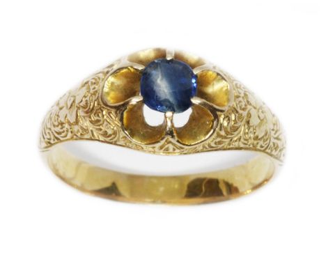 A yellow metal sapphire ring, marked 'K' only, gross weight 4.7g, size P.  Condition - evidence of re-sizing to band, general
