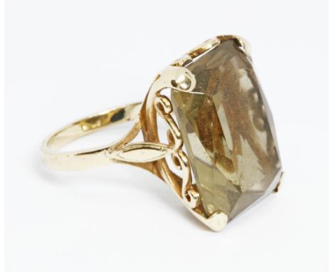 A 9ct gold citrine ring, the rectangular stone measuring approximately 20mm x 14.80mm, depth 8.27mm, hallmarked, sponsor 'ATC